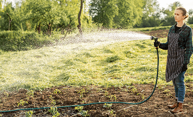 woman-watering-crops 1 (1)